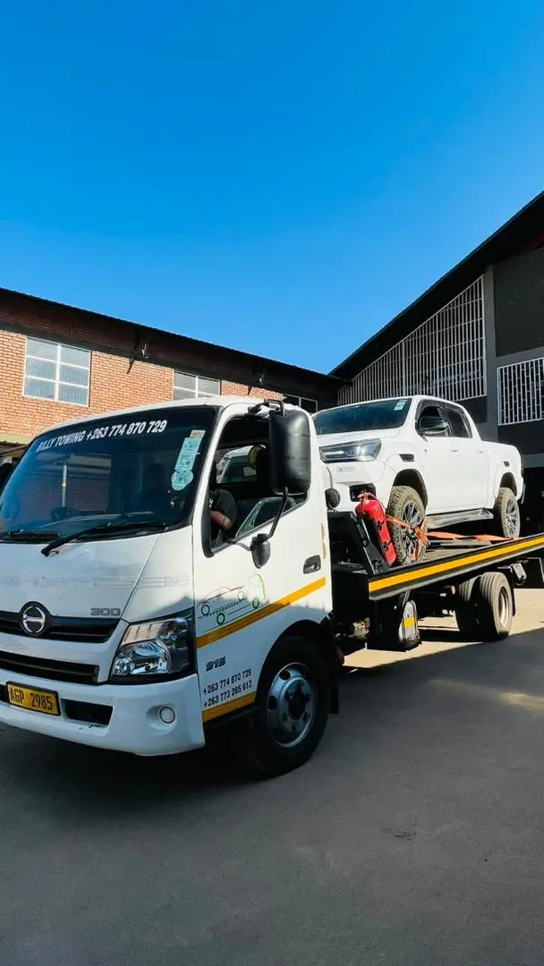 Isuzu vehicle carried on a Billy Towing flatbed